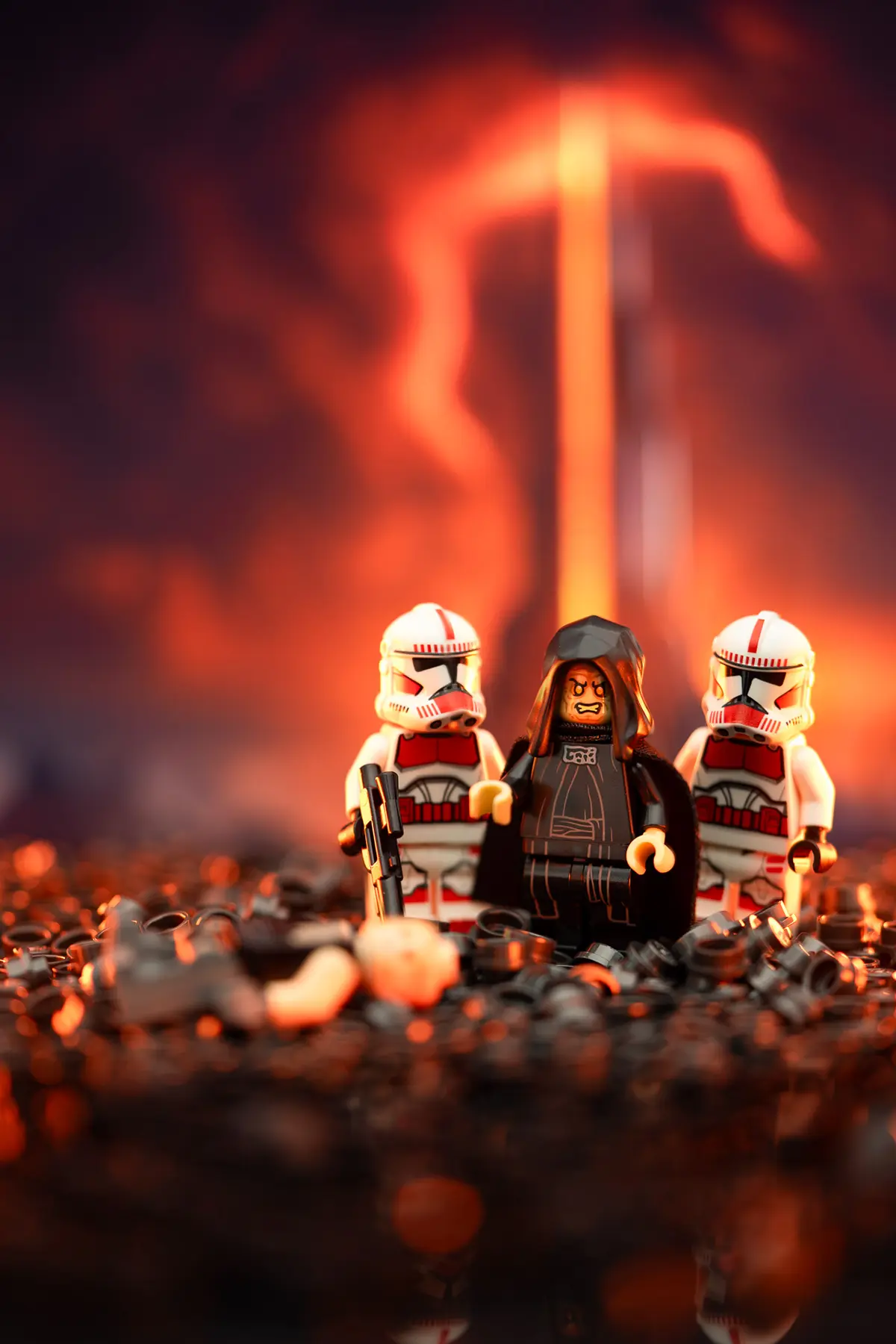 LEGO Emperor Palpatine and two Clone Troopers stand amid glowing black terrain under intense lava lighting. The scene is enhanced with vivid highlights and contrast, emphasizing the heat and destruction, while the fallen figure and dramatic lava backdrop add cinematic depth.