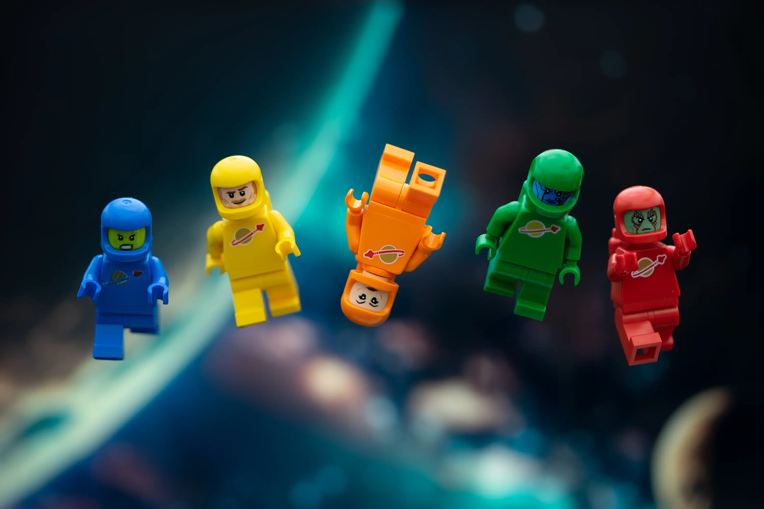 A team of dark blue LEGO Classic Space astronauts rides...